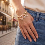 Blushline Pink Heart Twist Wire Bangle worn on the wrist