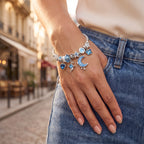 Nightfall Blue Moon and Star Cable Bangle worn on the wrist