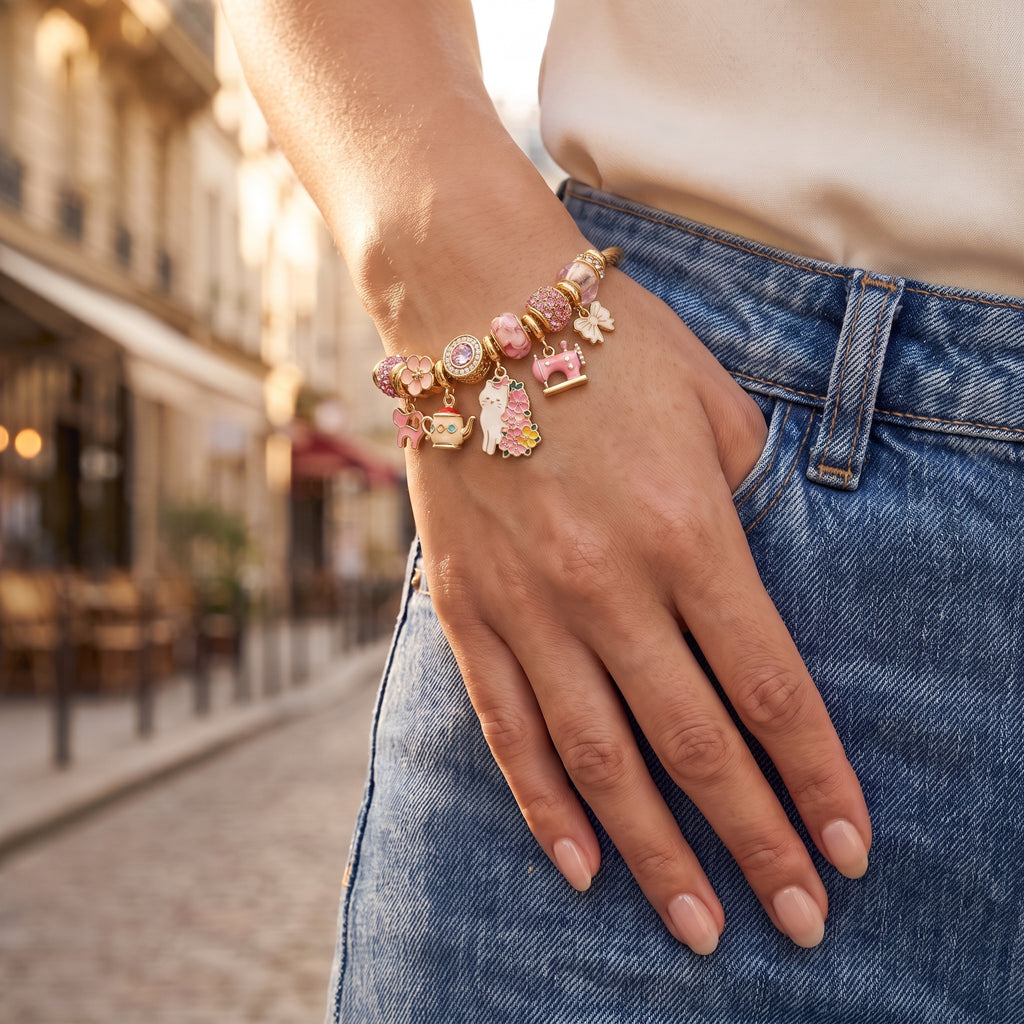 Orchard Cherry Blossom and Cat Twisted Bangle worn on the wrist