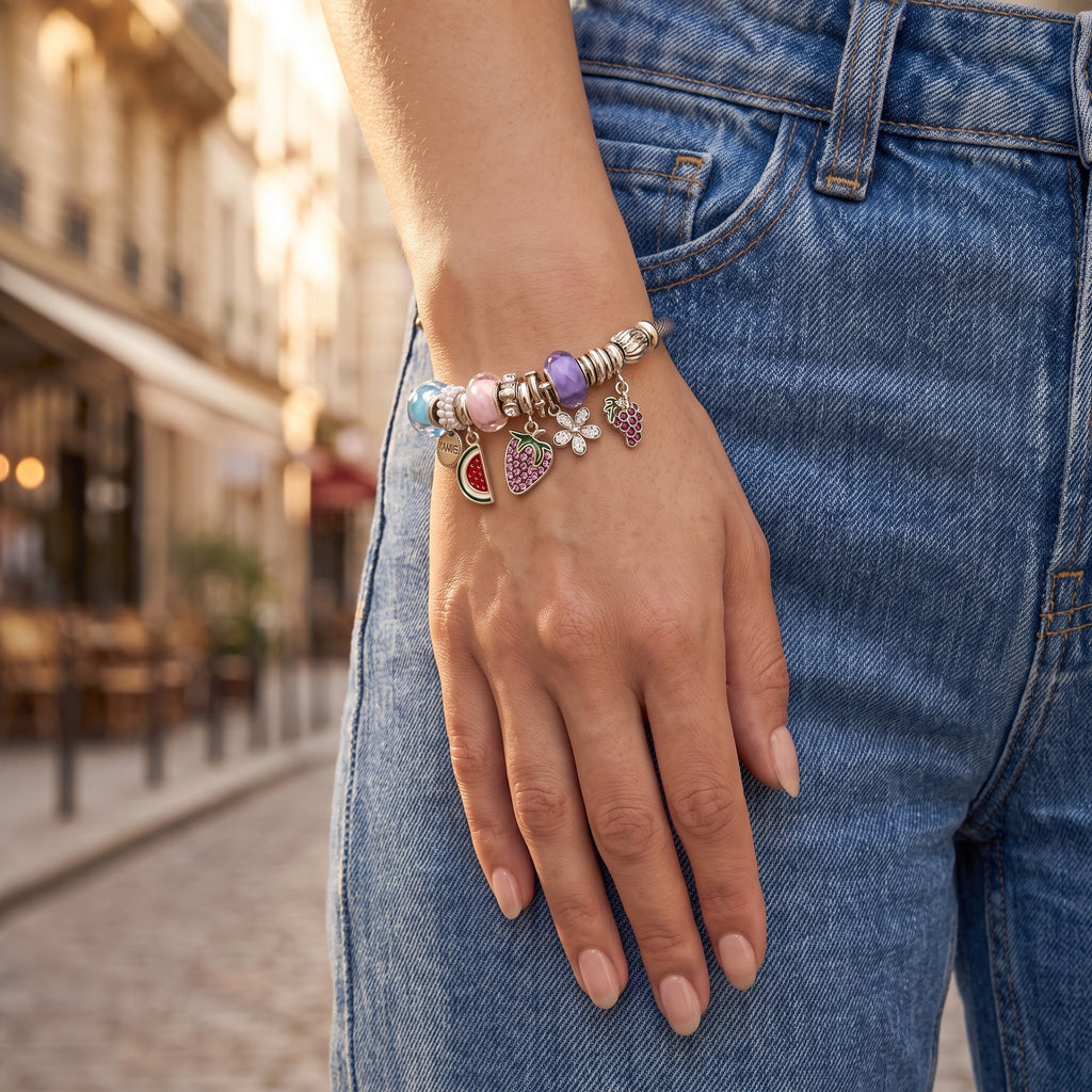 Orchard Fruit Charm Cable Bangle worn on the wrist