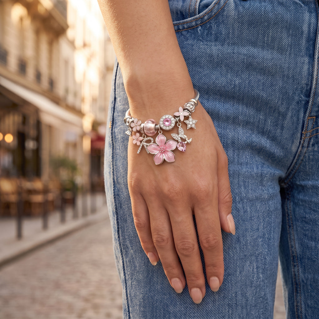 Orchard Sakura Blossom Silver Bangle worn on the wrist