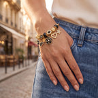 Verdant Black Clover Charm Bangle worn on the wrist