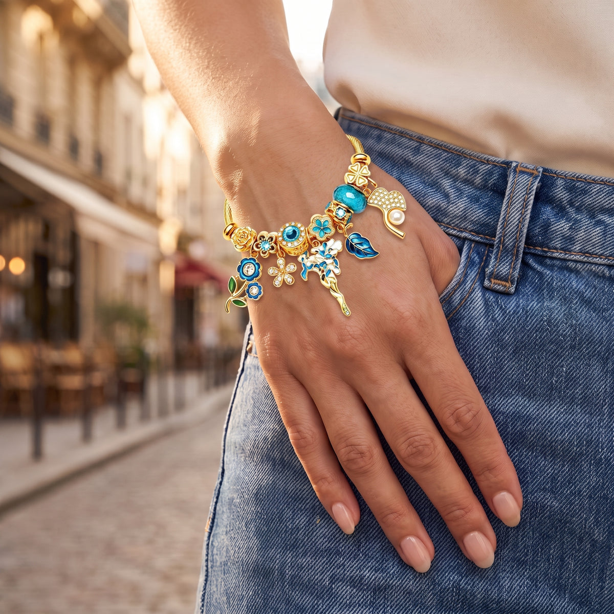 Wisp Teal Fairy Cable Wire Bangle worn on the wrist